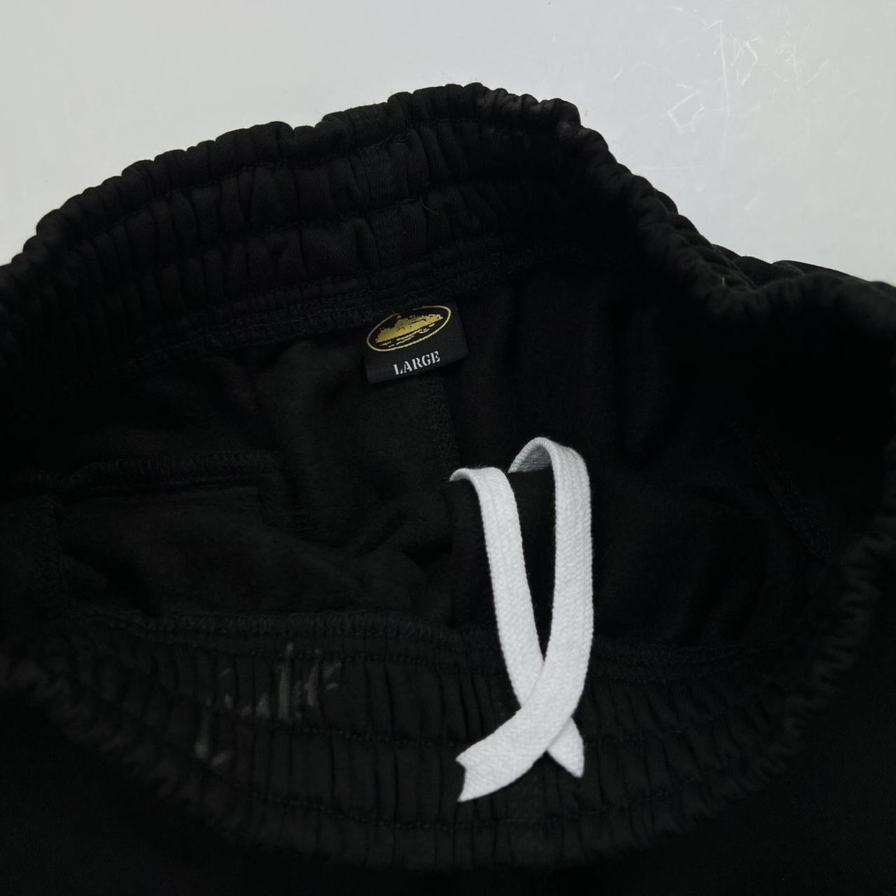 Corteiz Script / All Over Print Joggers In Triple Black