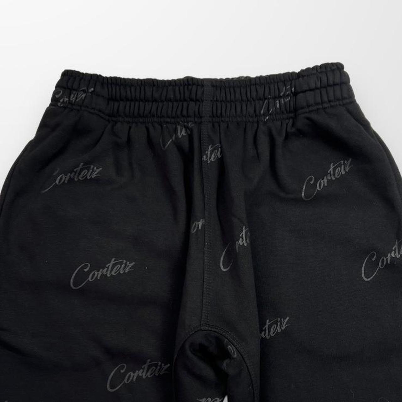 Corteiz Script / All Over Print Joggers In Triple Black