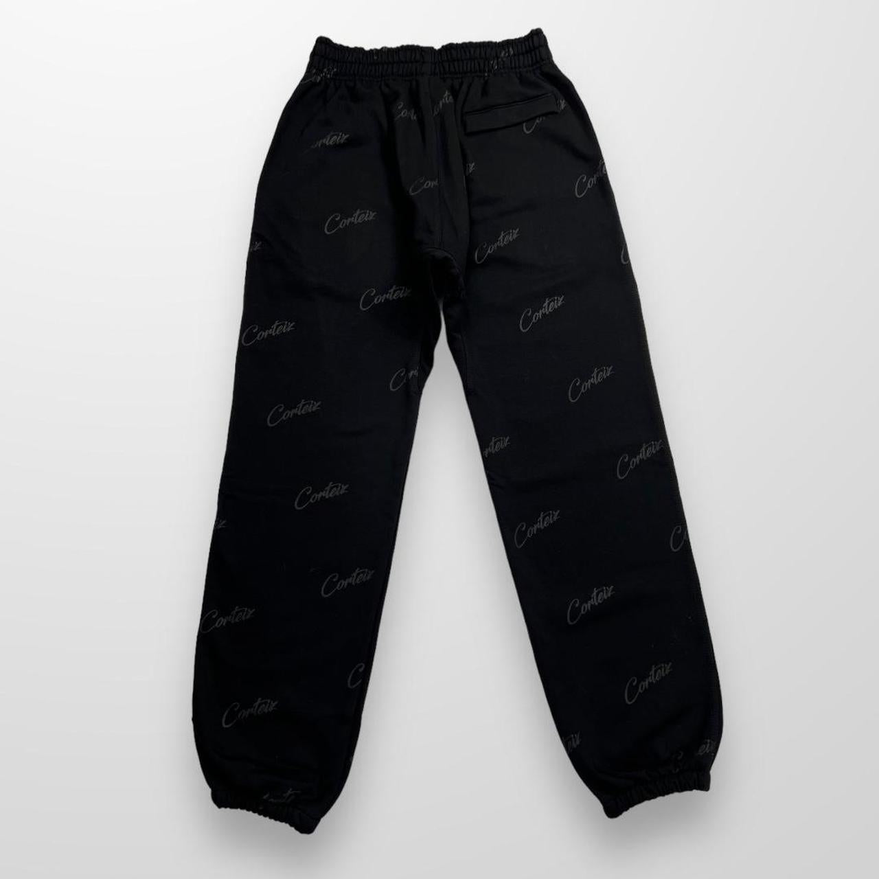 Corteiz Script / All Over Print Joggers In Triple Black
