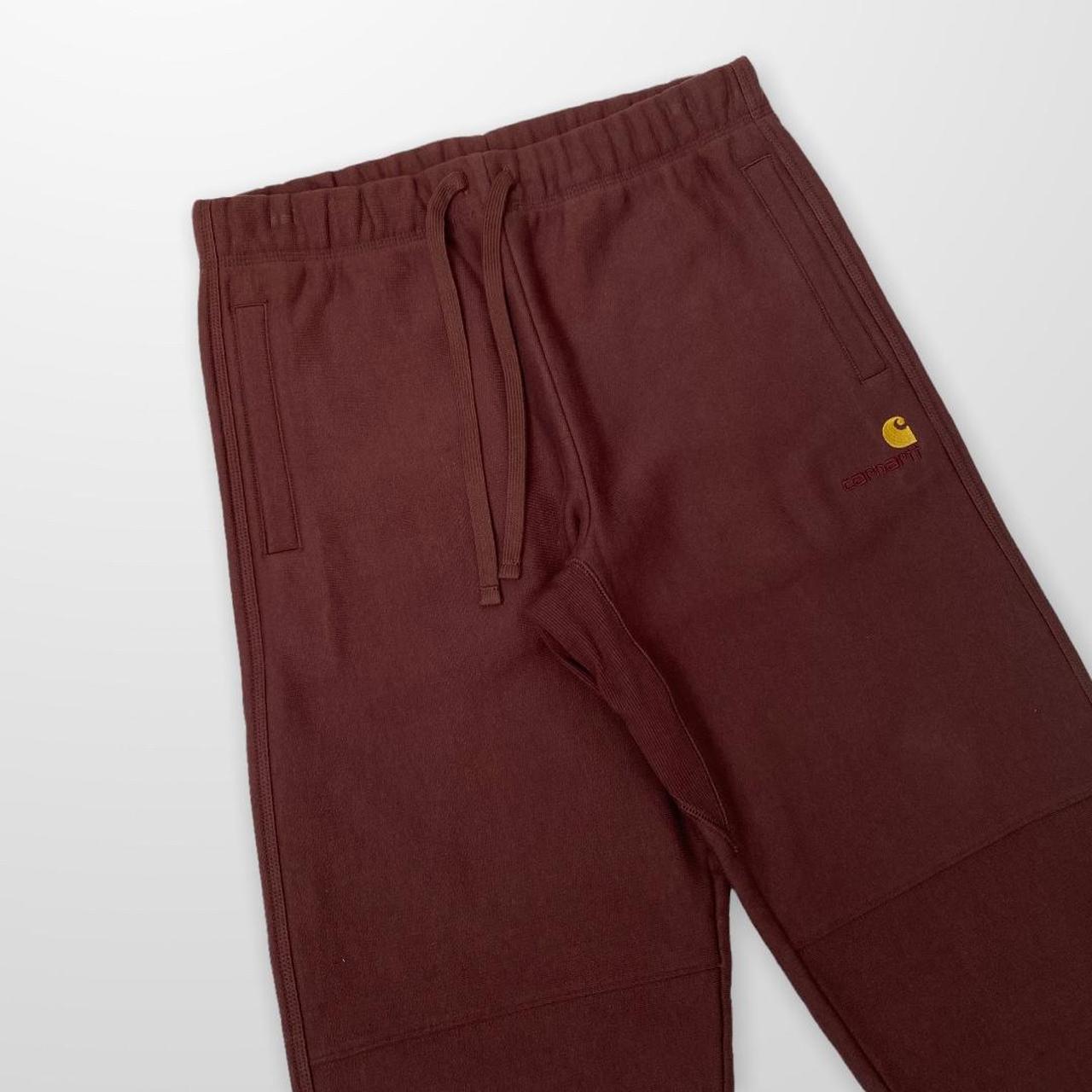Carhartt WIP American Script Jogging Pant In Brown