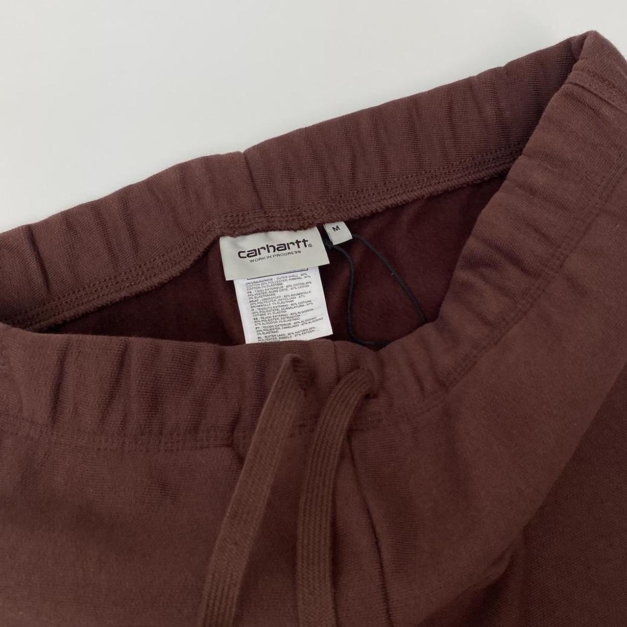 Carhartt WIP American Script Jogging Pant In Brown